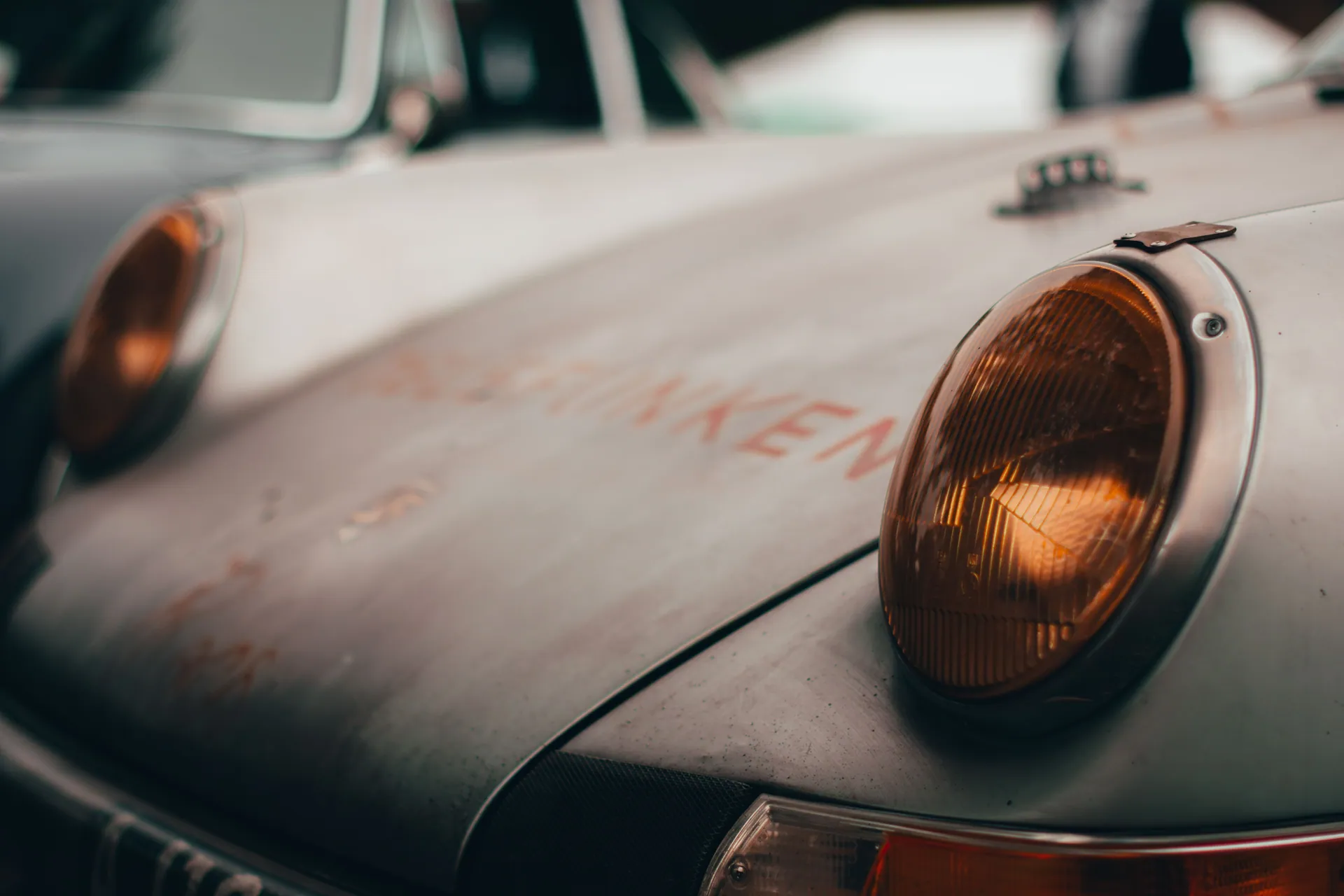 A detailed close-up of vintage car headlights capturing retro charm.
