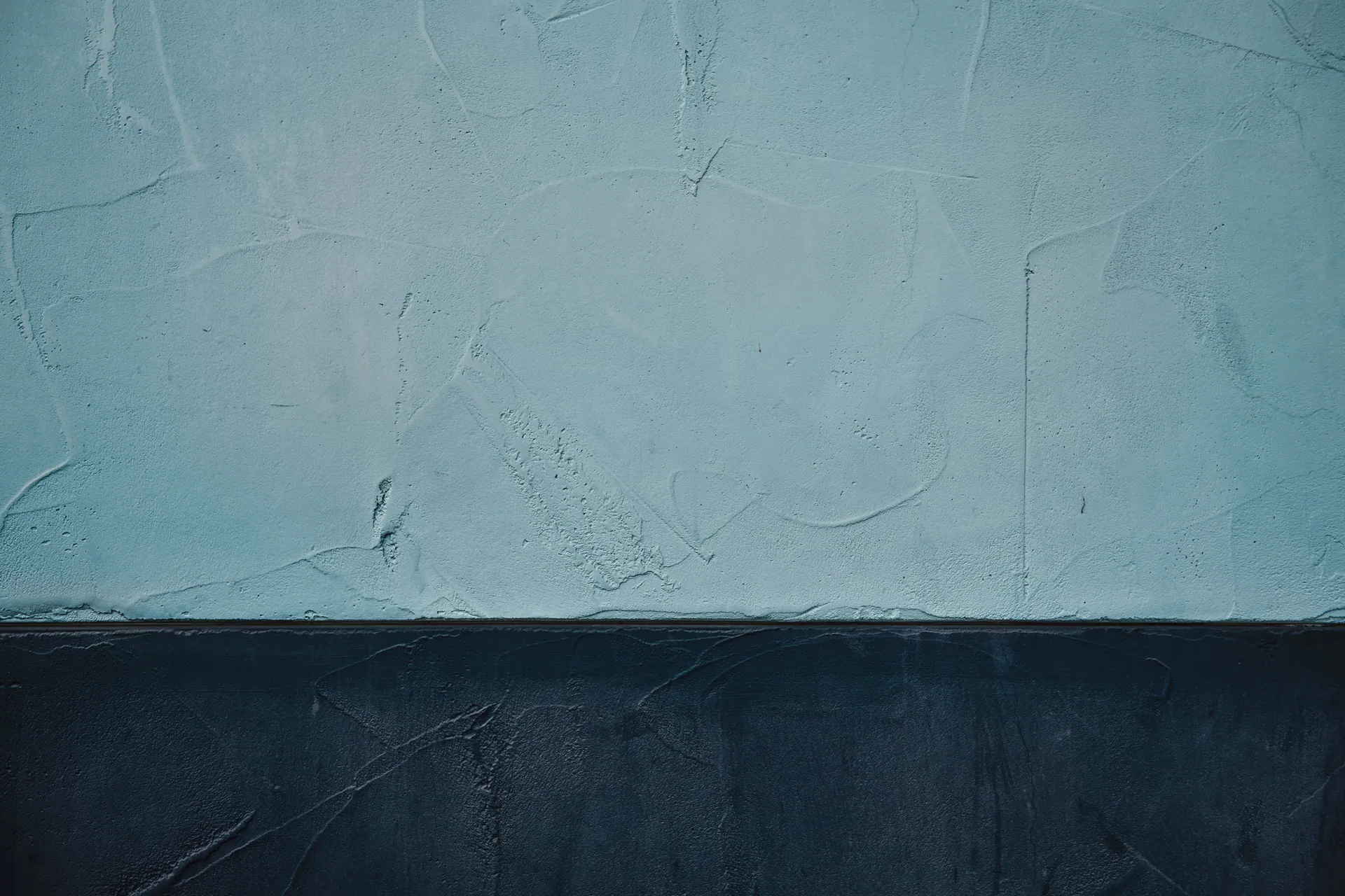 Detailed textured wall art showcasing vintage style with contrasting blue tones.
