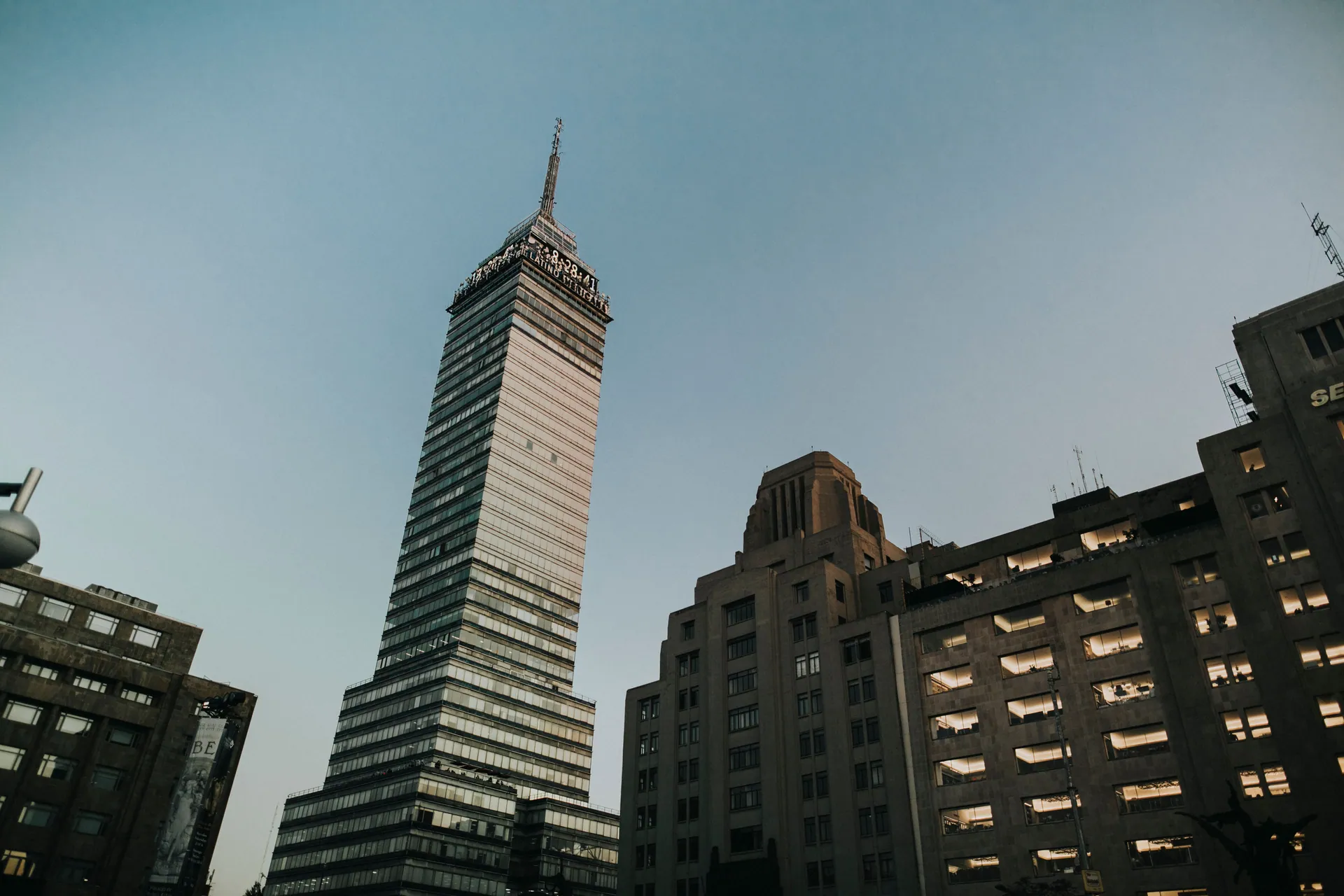 View of the Torre Latinoamericana towering over Mexico City's urban skyline.