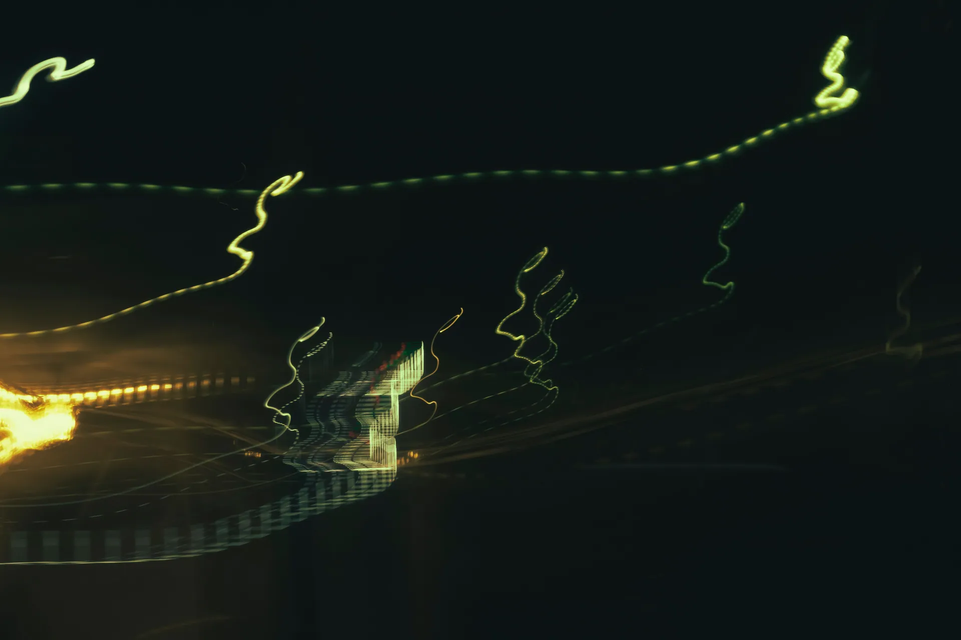 Artistic photo capturing abstract light patterns at night in Mashhad, Iran.