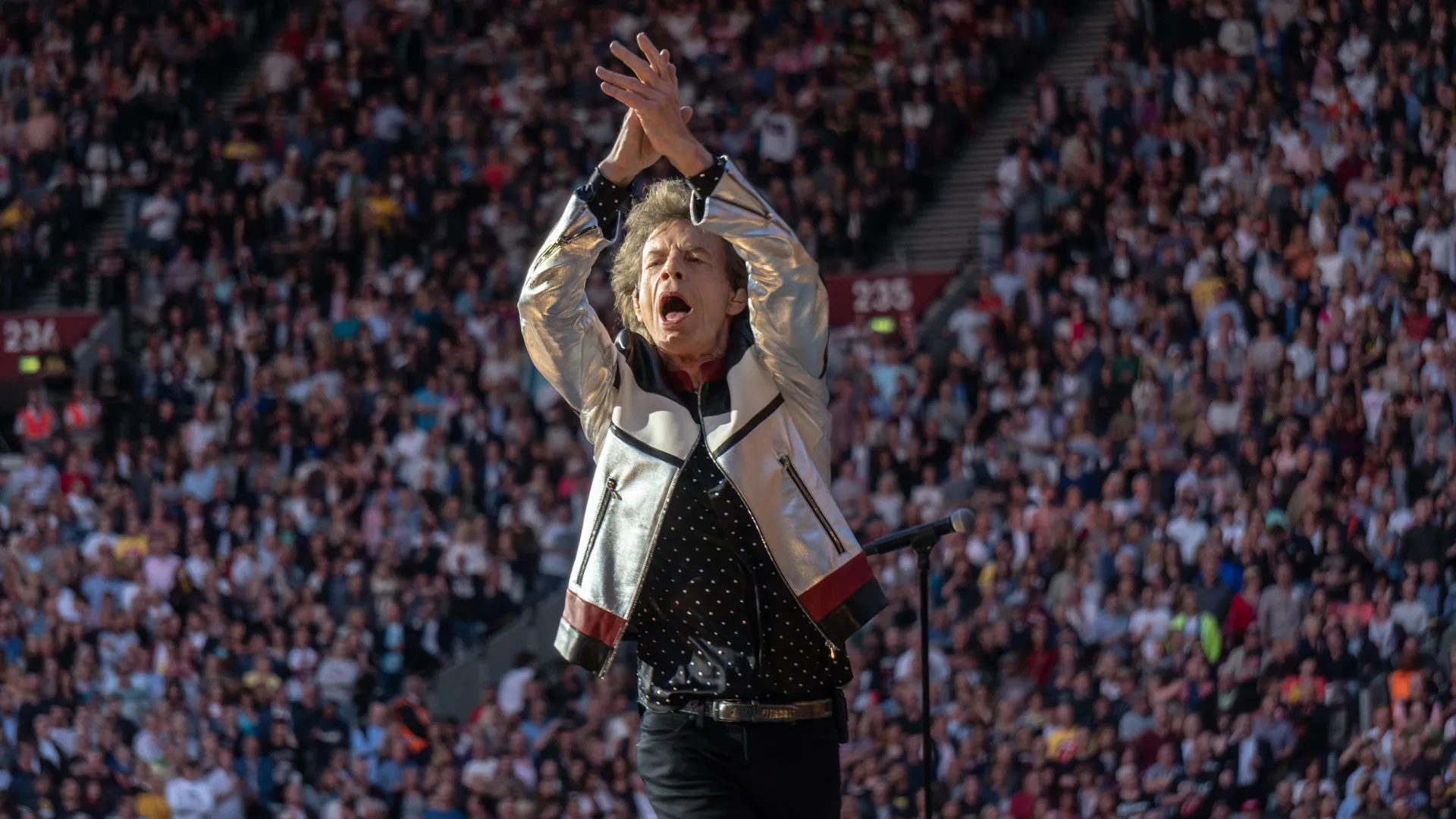 Mick Jagger claps onstage during Rolling Stones concert, London - 22 May 2018