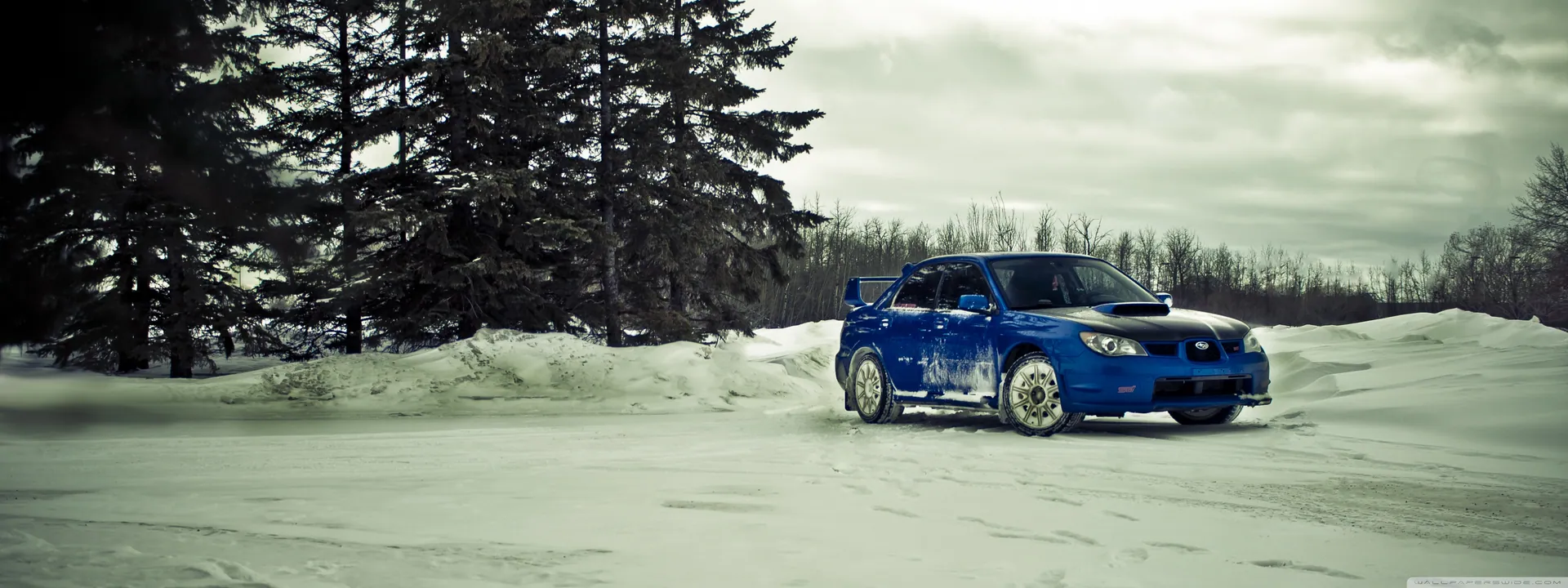 subaru_sti_winter-wallpaper-3840x1440