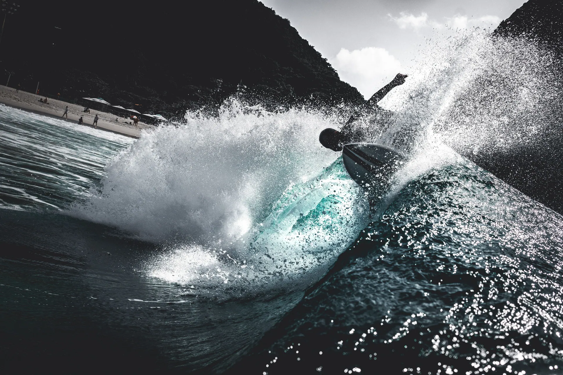 Capture the thrill of surfing with this dynamic ocean wave action shot.