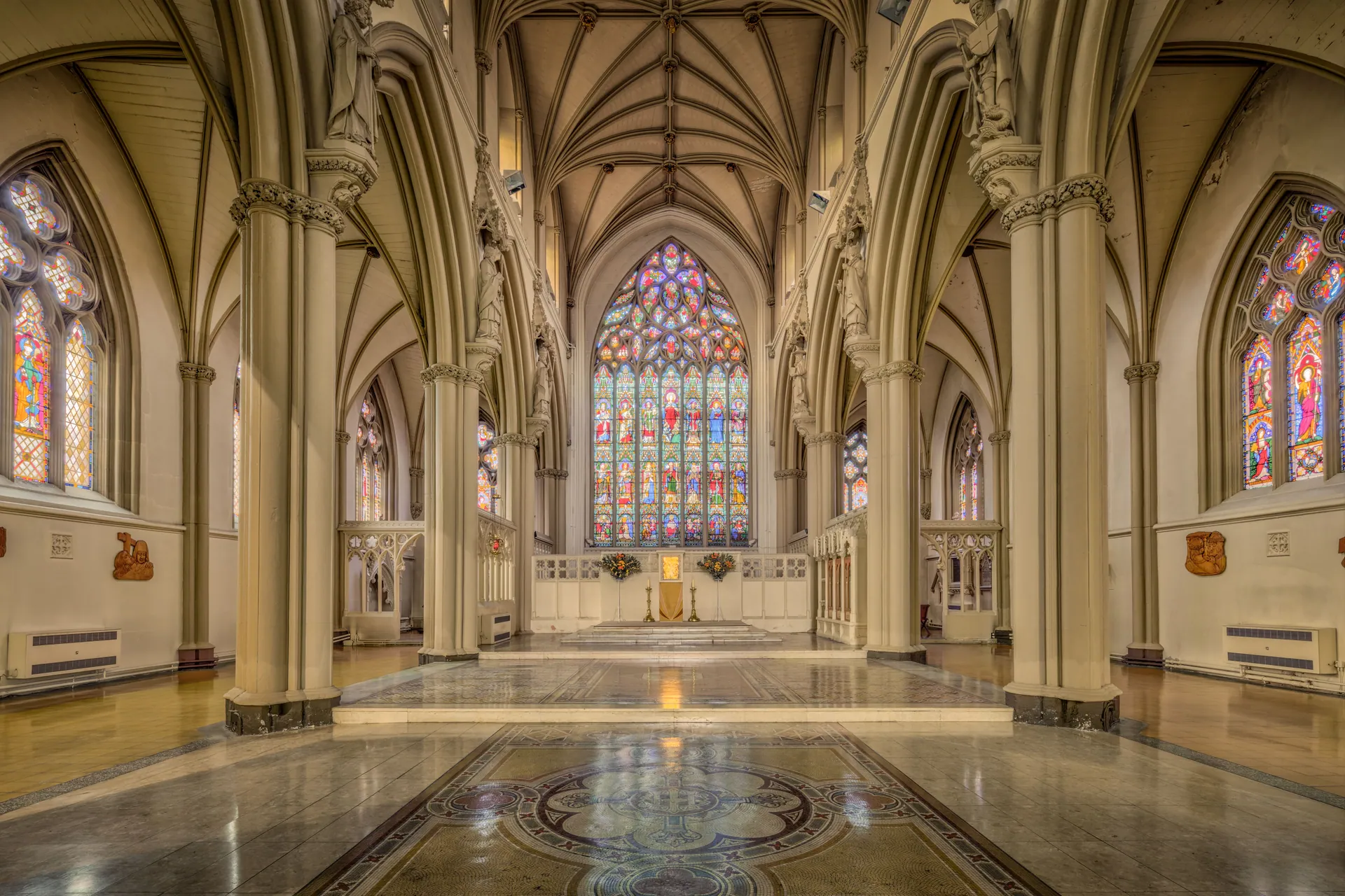 Interior view of Salford Cathedral's intricate gothic architecture in England.