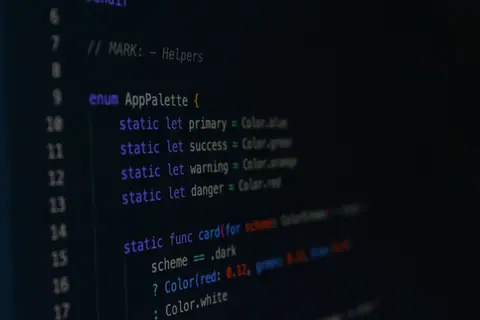 Macro photography of color palette code in a programming environment.
