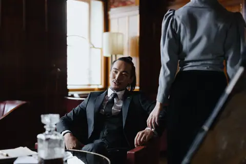 Business professionals engaging in a meeting in a classic office. Stylish and elegant ambiance.