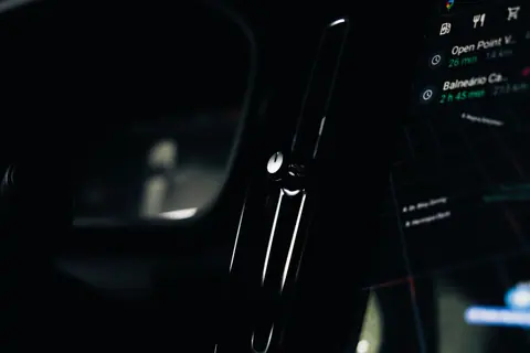 Close-up of a modern car's dashboard and touchscreen display, capturing the sleek interior design.