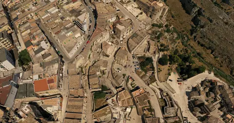 Drone capture of historic architecture in scenic Basilicata, Italy.