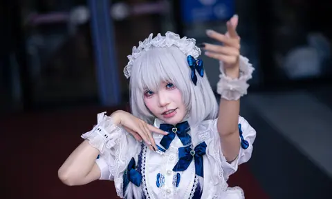 A creative and vibrant cosplay portrait of a young woman in detailed costume.