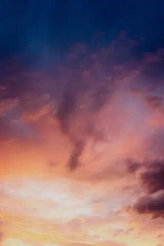 Captivating sunset sky filled with colorful and dramatic cloud formations.