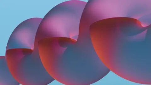 Colorful abstract geometric shapes resembling shells, featuring vibrant red, pink, and blue hues on a blue backdrop.