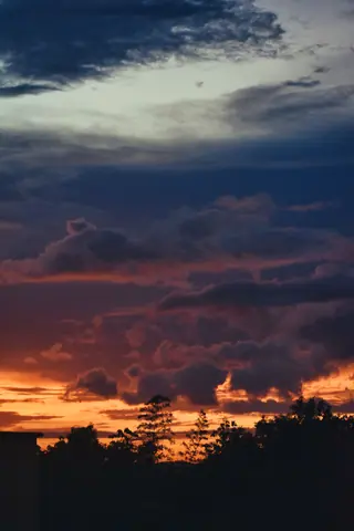 A breathtaking sunset with vibrant clouds and rich colors painting the sky.