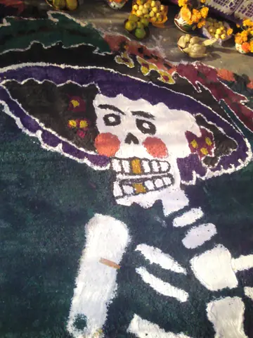 Catrina hecha con aserrin pintado