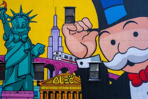 Vibrant mural in NYC featuring iconic landmarks and pop culture symbols.