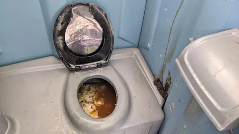 Karel Doormanstraat Dixi toilet after a concert, Rotterdam-Centrum, Rotterdam (2023) 04