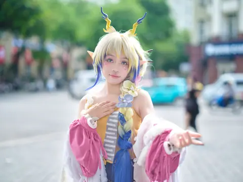 Colorful character cosplay scene featuring a vibrant costume in an urban setting with a whimsical touch.