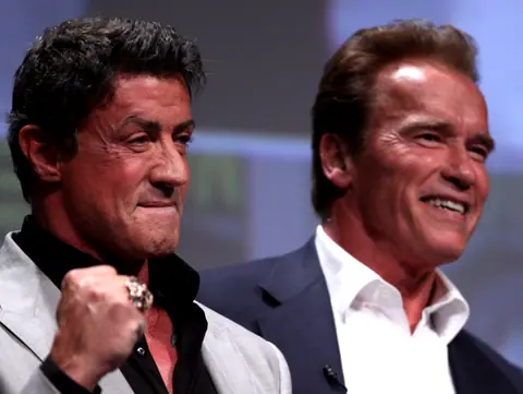 Sylvester Stallone & Arnold Schwarzenegger (7588432508) (cropped)