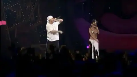 Dina Rae and Eminem Performing on The Anger Management Tour in 2002