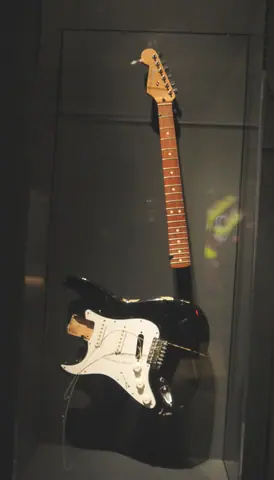 Kurt Cobain's Fender Stratocaster (1993, left-handed), demolished by him in Inglewood, California, during the 1993 tour in support of album "In Utero" - Play It Loud. MET (2019-05-13 19.35.27 by Eden, Janine and Jim)