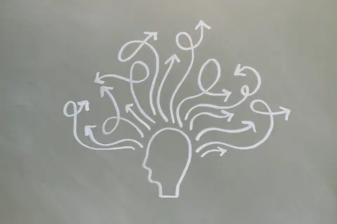 Conceptual chalk drawing illustrating mental health challenges with arrows representing thoughts.