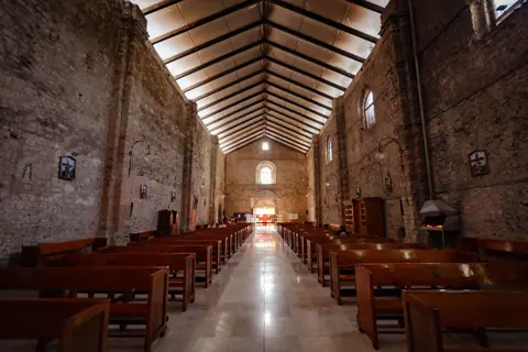 Beautiful interior view of a historic church in Huauchinango, Mexico, showcasing its architecture and spiritual ambiance.