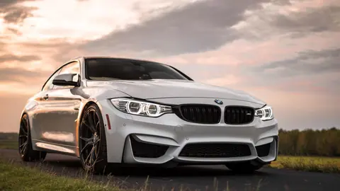 bmw-m4-white-road-grass