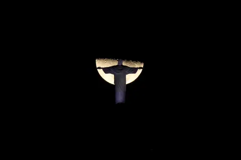 Unique Moment with the Moon and Christ the Redeemer 5