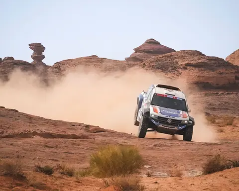 Dramatic off-road vehicle navigating the rocky desert with dust trail.