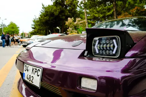 Detailed view of a stylish purple car with pop-up headlight in Ankara, Türkiye.